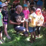 Kiwi handler,Ben Barr shares a kiwi moment at the 2014 kiwi release